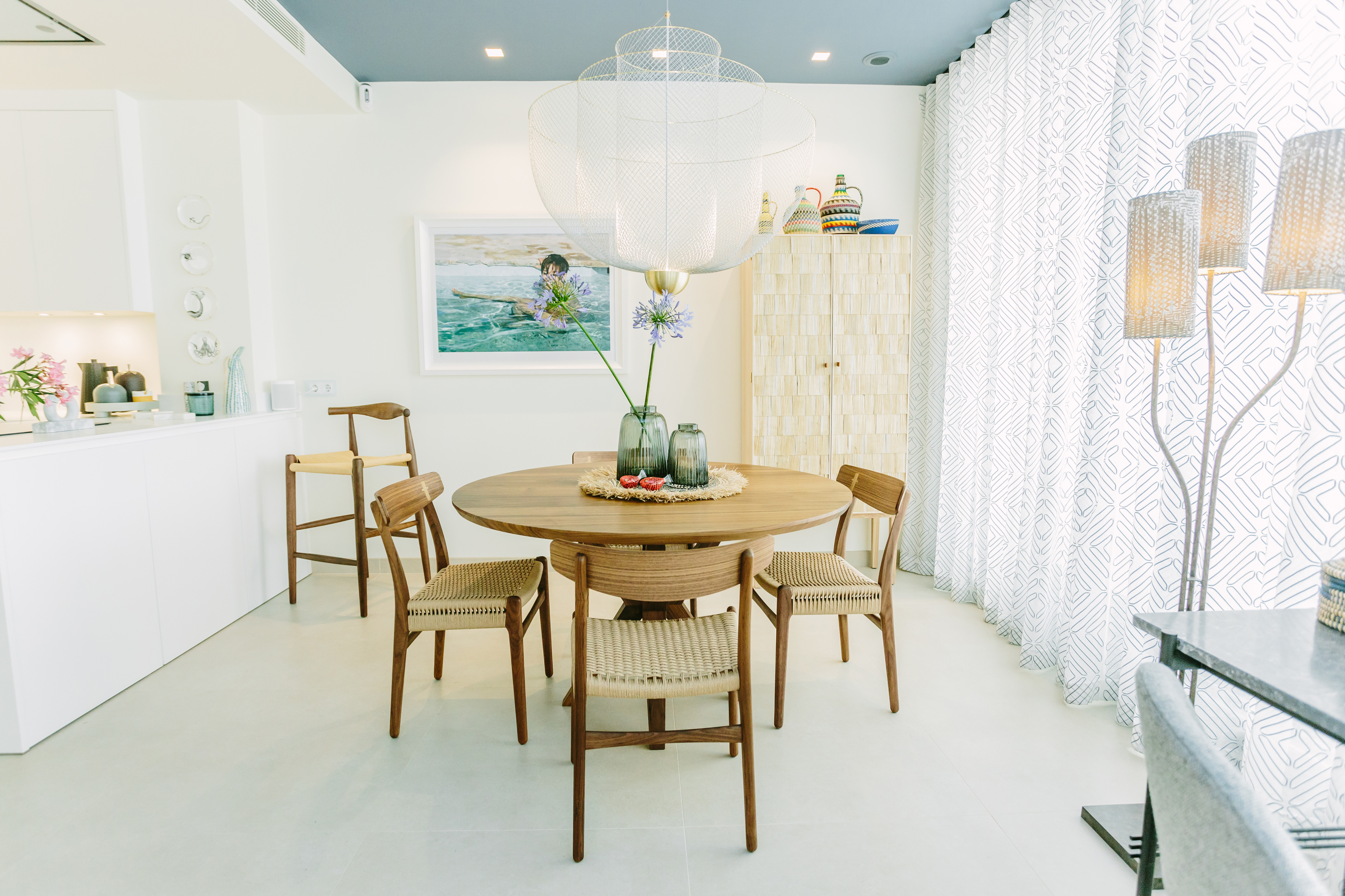benchmark table and shake cupboard in the dining area