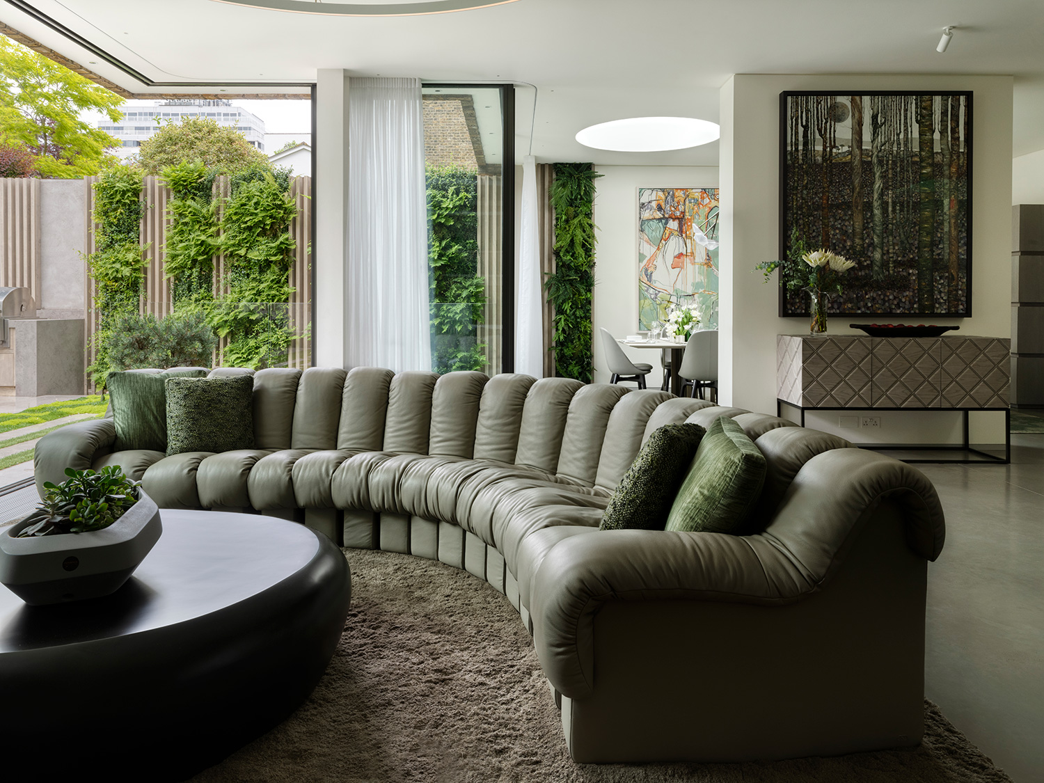 The flow of family life from within to without is invigoratingly captured in the open-plan kitchen, dining and living.