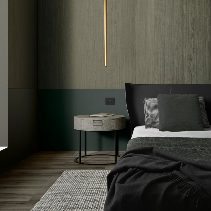 bedroom with bed and bedside table